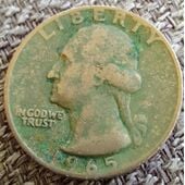 Moneda de un quater de EEUU del año 1965.